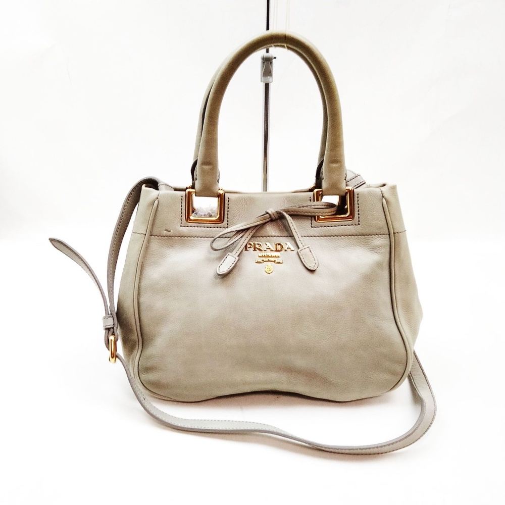 PRADA - Vitello Bow R1.277